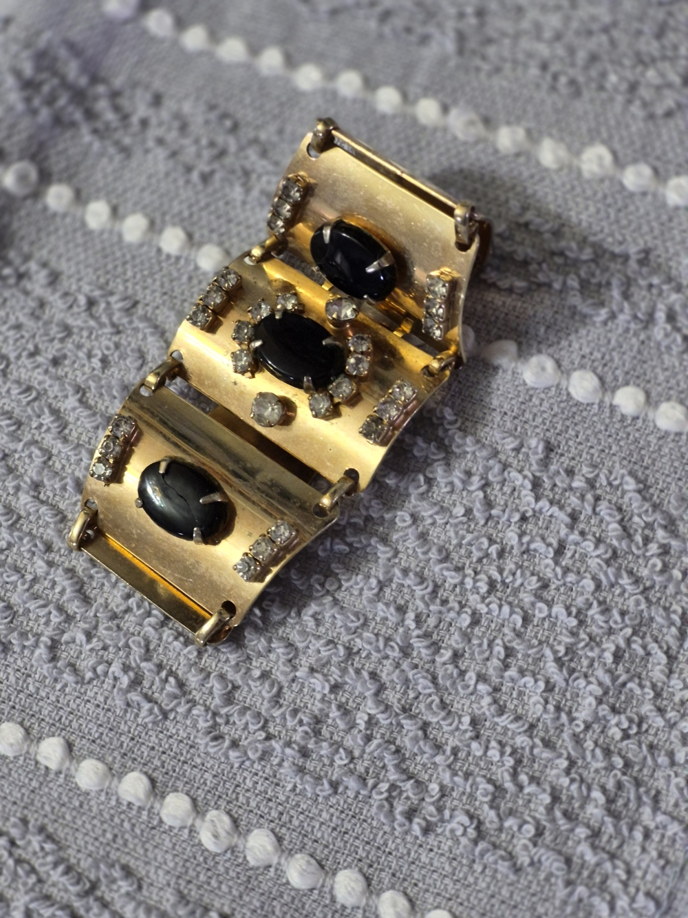Gold-Tone Bracelet with Black Cabochon Stones and Clear Crystals